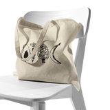 Eat_Your_Veggies_Tote_CottonTote_S_Chair_AS_Mockup.png